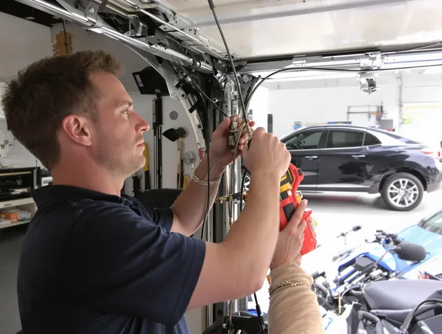 Eastvale Garage Door Repair safety certified technician performing cable replacement in Eastvale