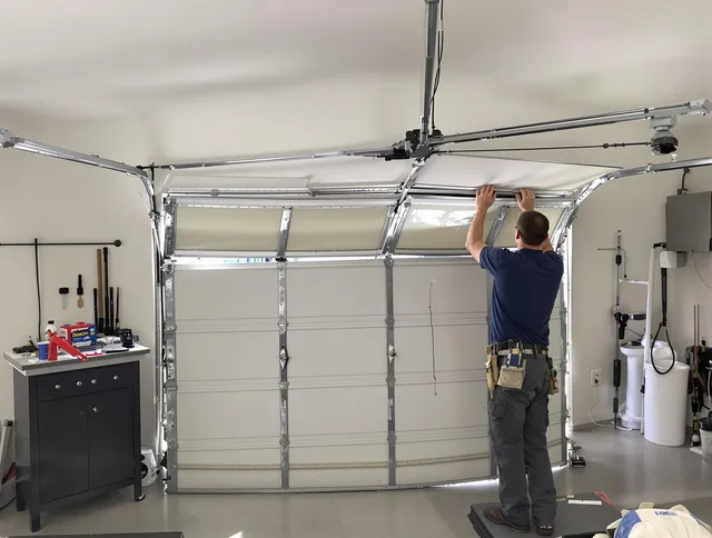 Eastvale Garage Door Repair specialist performing precise section replacement on Eastvale garage door