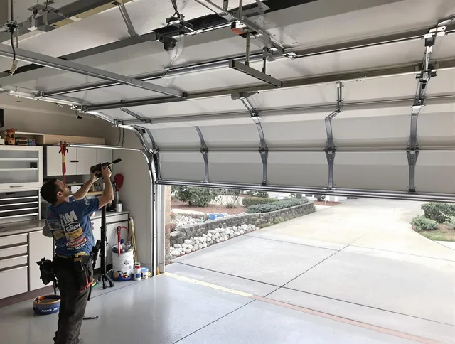 Garage door track repair service by Eastvale Garage Door Repair in Eastvale